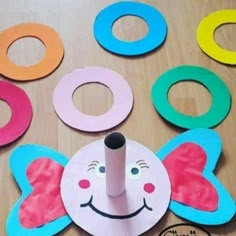 an elephant craft is on the table with circles around it