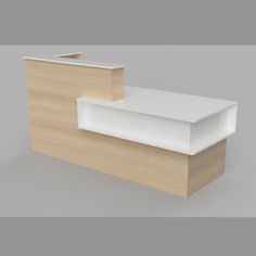 a white counter top sitting on top of a wooden shelf