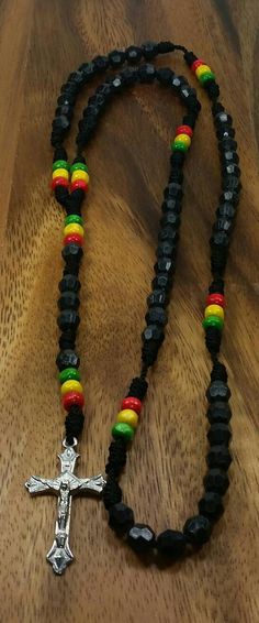 Black rosary necklace Beaded Rosary Rasta Rosary Colors | Etsy Adjustable Black Beaded Necklaces With Round Beads, Black Beaded Necklaces With Colorful Beads For Spiritual Use, Black Spiritual Beaded Necklace With Colorful Beads, Spiritual Black Beaded Necklaces With Colorful Beads, Spiritual Black Beaded Necklace With Colorful Beads, Adjustable Black 8mm Beads, Adjustable Black Jewelry With Wooden Beads, Adjustable Black Hand-strung Beaded Necklaces, Black Wooden Beads Rosary Spiritual Style