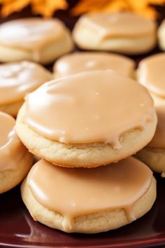 some cookies with icing on top of each other