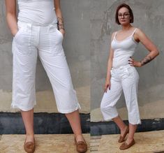 Cozy 90s vintage white women capri activewear pants. Trousers are made of high quality lightweight cotton blend fabric. Cropped pants has two pockets on the front. The bottoms of legs can be drawn up with strings. Perfect for both for everyday wear and activewear or fitness. Even for summer jogging as part of your tracksuit. ▼ D e s c r i p t i o n �▼ COLOR: White BRAND: Blue CONDITION: Excellent Vintage MATERIAL: 70% cotton, 30% nylon SIZE: Marked size EU 36. Fits like sizes S - M, but please re White Capri Pants, Womens Capri Pants, Jogging Bottoms, Womens Capris, Jogging Pants, Active Wear Pants, White Brand, White Pants, 90s Vintage