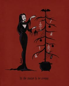 a woman standing next to a tree with decorations on it and the words, its the season to be creepy