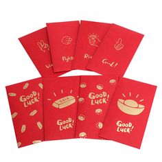 five red cards with gold foil designs on them and the words good luck written in different languages