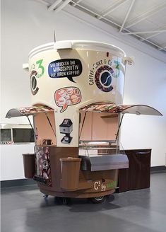 an ice cream cart is parked in a building