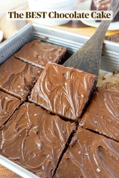 the best chocolate cake is cut into squares and placed in a pan with a spatula