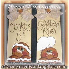 two wooden signs with the words cookies and bakers written on them, one has a chef's hat