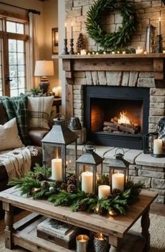 a living room decorated for christmas with candles and wreaths on the fireplace mantel