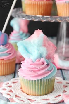 cupcakes with pink, blue and white frosting