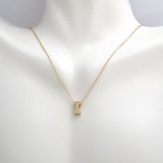 This pendant necklace is crafted in 14 Karat yellow gold. Featuring the letter "I" on a adjustable necklace measuring 16 or 18 inches in length. I Initial Necklace, I Necklace, I Initial, The Letter I, New Jeans Style, Letter Pendant Necklace, Initial Pendant Necklace, Classy Work Outfits, Letter I