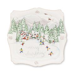 a white plate with a christmas scene on it