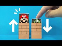 a hand is pointing at some paper mario and luigi in a brick wall with arrows