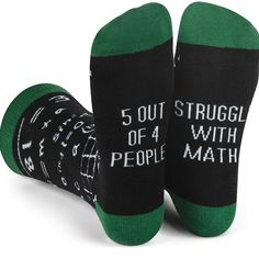 two pairs of socks that say, out struggle of a people's math class