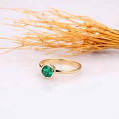 Metal Type: Solid 14k gold. Center Stone: Lab Created Emerald Center Carat Weight: Round Cut 0.80CT(6.0mm) Color: Green-5A Clarity: VVS Band Width: 2.70mm SKU: ESR0279-EM0.8CT Accessories: *Shipped with beautiful ring box; *Directly price from Manufacturer, 1/3 the price from Jewelry Store; Esdomera - Ethically Sourced Gold Solitaire Emerald Birthstone Ring, Gold Solitaire Birthstone Ring For May, Gold Emerald Solitaire Birthstone Ring, Yellow Gold Solitaire Ring For May Birthstone, Gold Emerald Ring With Bezel Setting For Promise, Gold Solitaire Emerald Ring In Fine Jewelry Style, Gold Solitaire Emerald Ring Fine Jewelry, May Birthstone Yellow Gold Solitaire Ring, 14k Stamped Emerald Round Cut Gift Ring