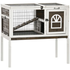 a white and brown rabbit hutch with stairs on the front, two doors open