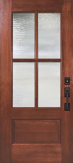 a wooden door with two glass panels