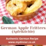 a bowl filled with apple fritters on top of a checkered table cloth