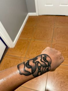 a person with a tattoo on their arm