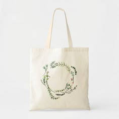 a tote bag with a wreath drawn on it