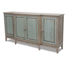 If you are looking for a piece that ties midcentury chic and modern charm with a coastal feel, look no further. This credenza has a grey, rich, warm tone with a touch of color on the doors. It has a wire brush distressing finish, which creates a wood grain, slightly textured effect. This versatile piece can be used in any room, in different capacities in your house. Its front cabinet projects a bit forward, creating more depth for the overall Item. Rosalind Wheeler | Rosalind Wheeler Sanibel 4-… Hallway Dresser, Dresser Brown, Kitchen Wine Rack, Small Space Kitchen, Warm Tone, Sideboard Furniture, Buffet Table, Table Seating, Kitchen Space