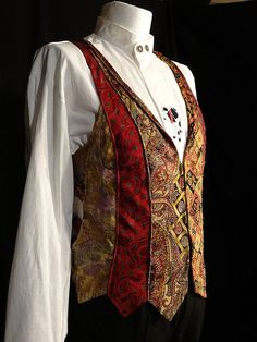 a mannequin dressed in an elaborately designed vest