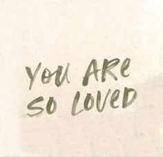 the words you are so loved written in black ink on a white paper with green writing