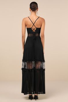 Everyone will be in awe of your aesthetic when you stroll in wearing the Lulus Deeply Stunning Black Lace Pleated Lace-Up Backless Maxi Dress! Lightweight woven fabric shapes this dramatic dress with slender spaghetti straps that lace up the open back, supporting a fitted bodice with a V-neckline and flattering ruching. Sheer lace panels lend a cutout effect to the bodice, atop a tiered skirt with airy pleats, lacy ruffles, and matching sheer panels throughout. Maxi hem completes the look. Hidde Black Sheer Maxi Dress, Elegant Maxi Dress With Boned Bodice For Cocktail, Elegant Sheer Backless Evening Dress, Luxury Fitted Dress With Sheer Back, Backless Lace Maxi Dress For Evening, Elegant Sheer Backless Maxi Dress, Chic Cocktail Maxi Dress With Boned Bodice, Backless Lace Evening Dress, Lace Backless Evening Dress