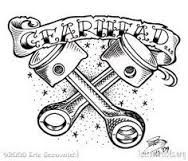 a tattoo design with two crossed wrenches