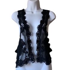 Nella Fantasia Vivo Crochet Lace Vest Sleeveless Black Nwt Medium Smoke/Pet Free Home * Reasonable Offers Considered * Sleeveless Lace Crochet Top For Festival, Lace Party Vest Tank Top, Lace Party Tank Top, Black Lace Top For Layering, Black Lace Patchwork Cami Top, Black Cami Top With Lace Patchwork, Chic Sleeveless Crochet Top For Festival, Fitted Lace Tank Top With Crochet Trim, Fitted Sleeveless Crochet Lace Top