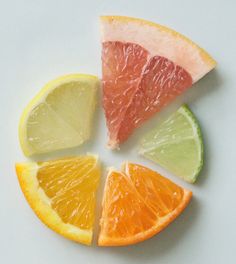 four slices of fruit are arranged in a circle