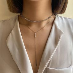 Style effortlessly with this unique layered duo. Consisting of two necklaces, mix and match with our patented design. Chain Italian chain, width 5mm Adjustable chain: 14-17in (35-43cm) Bar Lariat Necklace Drop Height 4.4in (11.2cm) Adjustable chain: 15-17in (38-43cm) .925 Sterling Silver Cubic Zirconia Hypoallergenic, lead and nickel free #034S-350S Jewellery Design Ideas, Italian Chain, Gold Chain Choker, Two Necklaces, Layered Choker Necklace, Necklace Layered, Layered Necklace Set, Multi Strand Necklace, Lariat Necklace