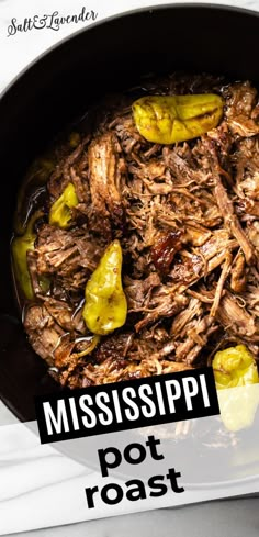 a close up of food in a pan with the words mississippi pot roast on it