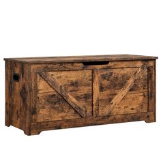 an old wooden storage box with sliding doors