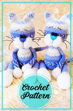 two crocheted cats sitting next to each other