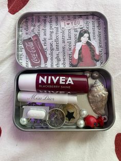 two tins filled with different types of items