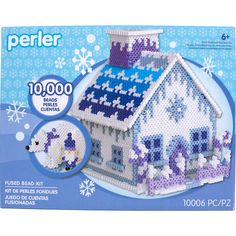 the perler kit has been designed to look like a house with snowflakes on it