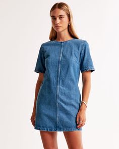 Easy-fitting short-sleeve mini dress in our classic denim fabric and shift silhouette, featuring on-trend seaming detail and crew neckline. Chic Mini Dress, Womens Shift Dresses, Denim Mini Dress, Short Sleeve Mini Dress, Dress Silhouette, Mini Shift Dress, Mini Dress With Sleeves, Rompers Women, Denim Fabric