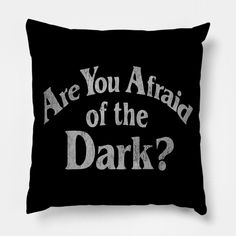 a black pillow that says are you afraid of the dark?