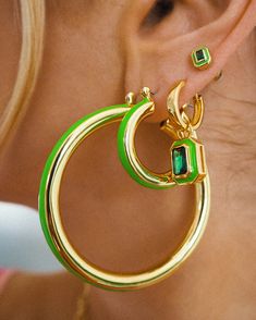 Pair of large metal tube hoops with a bright green enamel stripe Sold as a pair for pierced ears 50mm x 5mm Each hoop weighs 12 grams Made from Brass Plated Gold Posts are made from surgical steel so they are very hypo-allergenic for sensitive ears Earrings are 100% nickel-free and cadmium-free 1 year warranty Packaged in Luv Aj branded gift boxes Green Enamel Single Earring, Single Green Enamel Earring, Trendy Green Enamel Earrings, Modern Green Metal Earrings, Green Metal Hoop Earrings As A Gift, Modern Green Hoop Earrings As Gift, Modern Green Round Hoop Earrings, Modern Green Enamel Jewelry, Green Small Hoop Metal Earrings