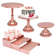 three tiered cake stands with cupcakes on top and two small cakes below