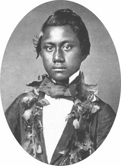 an old black and white photo of a young man