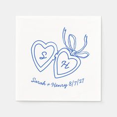 two hearts with initials on them are shown in blue ink