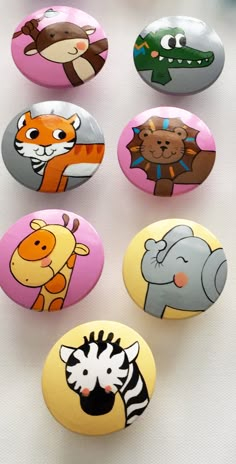 there are six buttons with animals on them