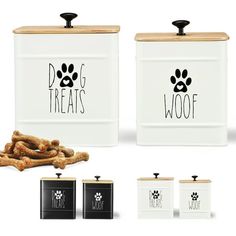 two white canisters with dog treats in them and one has a wooden lid