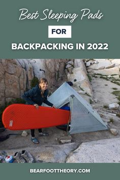 a woman holding a red surfboard next to a tent with the words best sleeping pads for backpacking in 2020