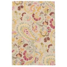 an area rug with various colors and designs on it, including pinks, yellows,