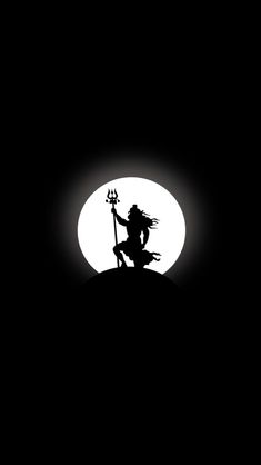 the silhouette of a person holding a scooter in front of a full moon