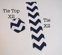 the tie is black and white with a chevron pattern on it's side