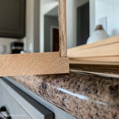 a close up view of some wood in a kitchen