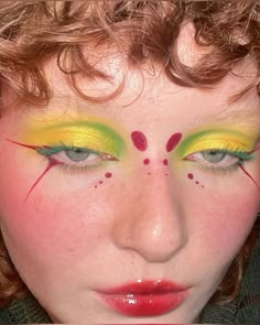 Eccentric Eye Makeup, Funky Make Up Looks, Colored Makeup Ideas, Eclectic Eye Makeup, Floral Makeup Ideas, Colorful Punk Makeup, Colourful Eye Makeup Looks, Retro Futuristic Makeup, Campy Makeup Looks