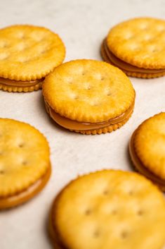 crackers are lined up on a baking sheet